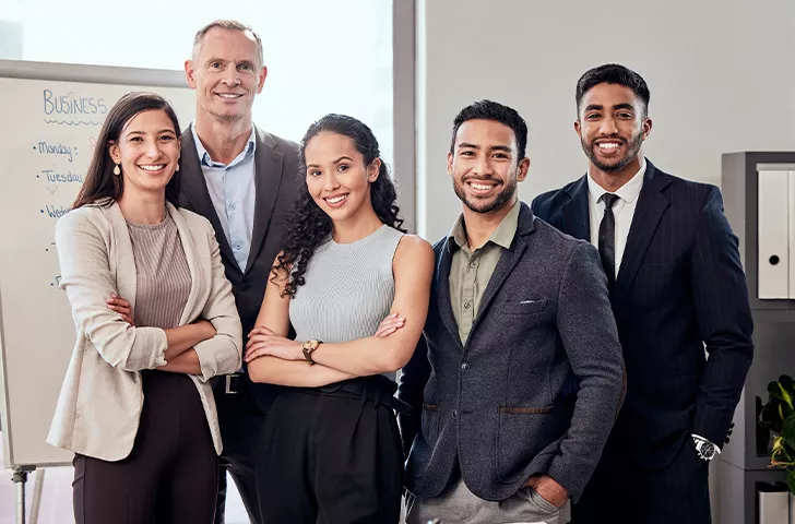 Team hands stacked in unity